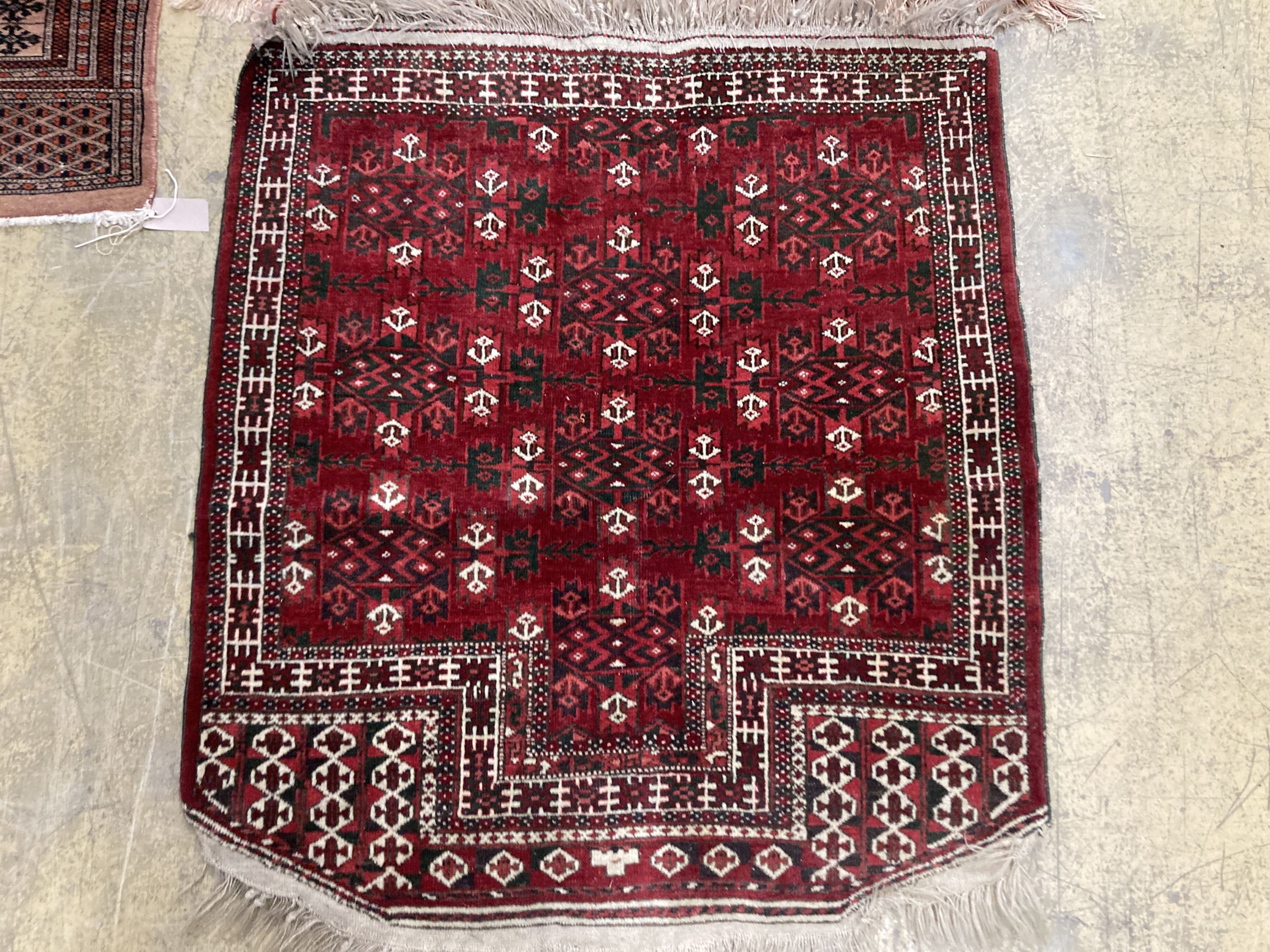 A Bokhara orange ground rug 198 x 125 cms, a smaller Anatolian flat weave rug and Bokhara prayer mat.
